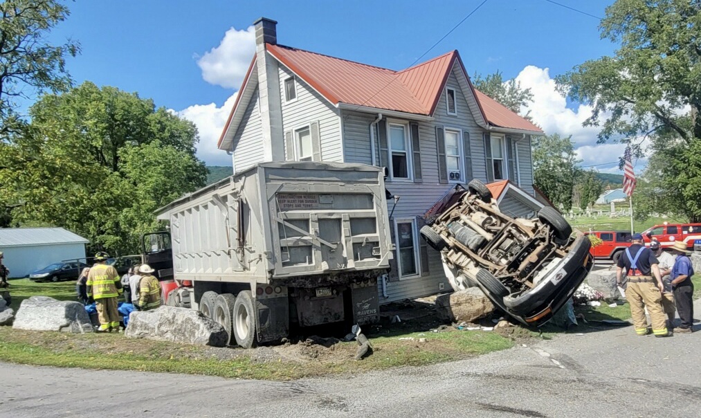 Van and dump truck collide near Oval News, Sports, Jobs